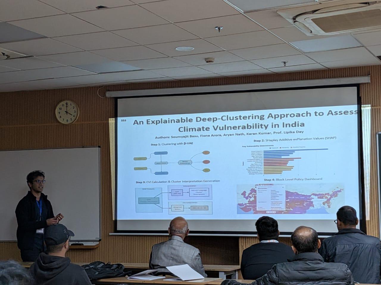 Aryan Nath presenting the research at PReMI.